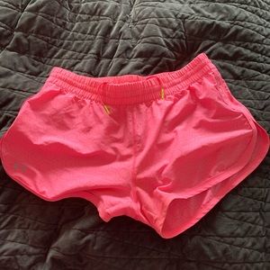 Neon pink running shorts